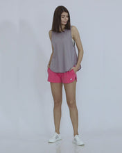 Load and play video in Gallery viewer, Check out how we pair off our Plum Purple Buttersoft Tanktop with our MW dolphin shorts and double cross sports bra
